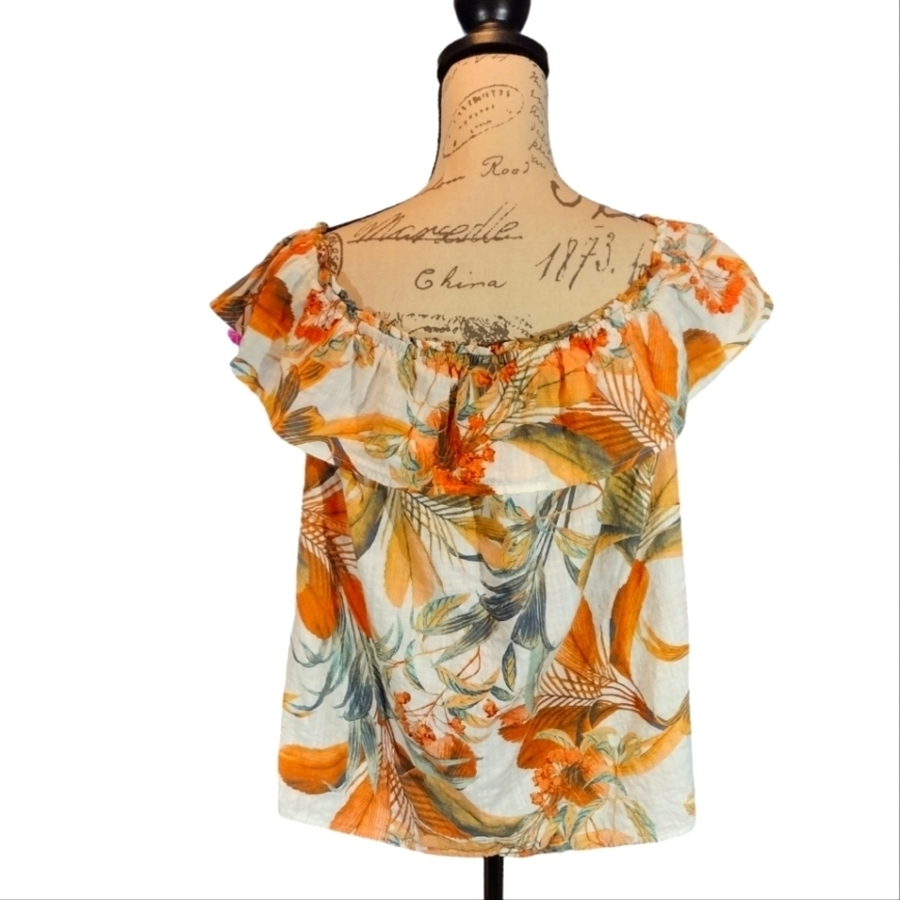 a n.a. Peasant Top